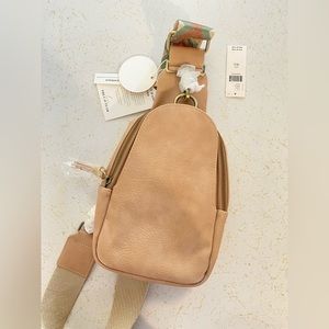 Faux leather sling backpack purse